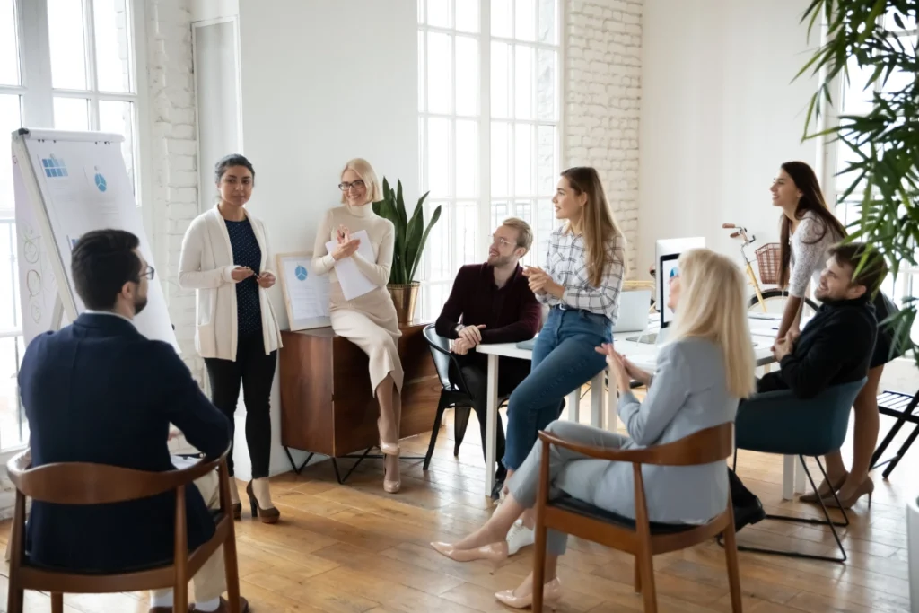 Team having meeting in bright, open room